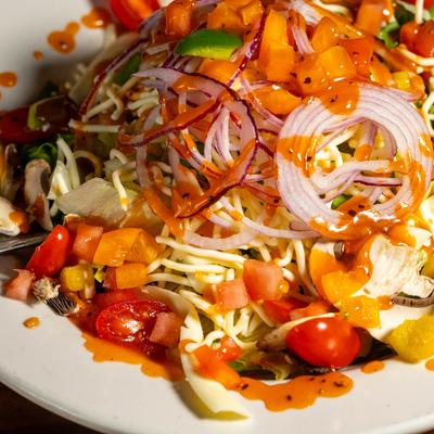 House salad with dressing.