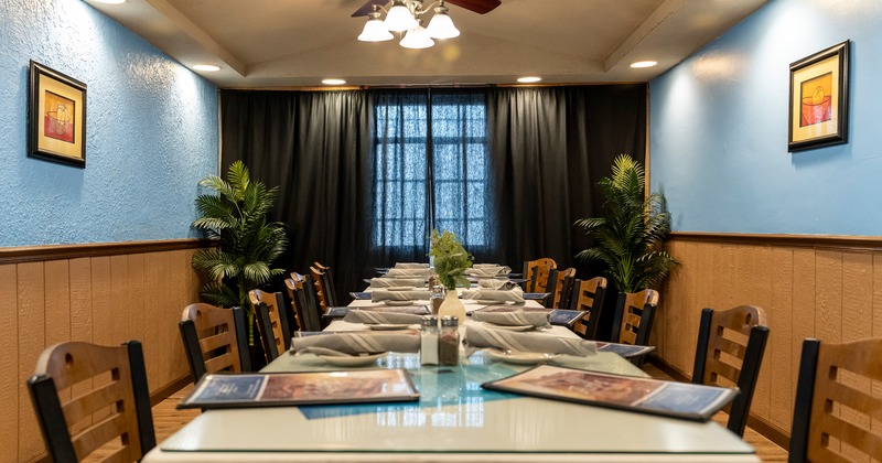 Private dining room with a dining table set for guests