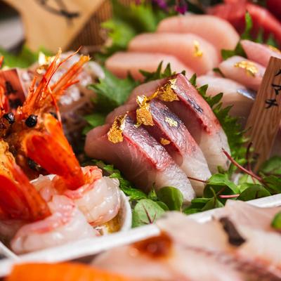 Sushi and sashimi platter, closeup.