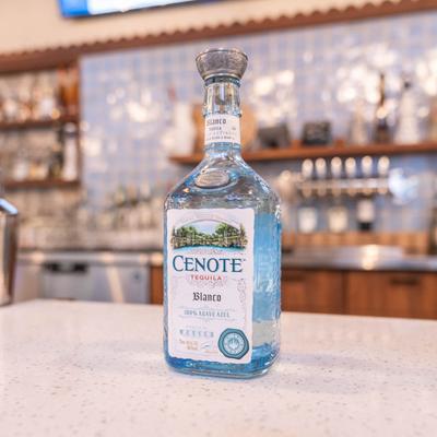 A bottle of Cenote tequila.