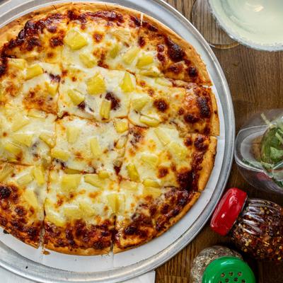Hawaiian Pizza, with pineapple, and cheese.