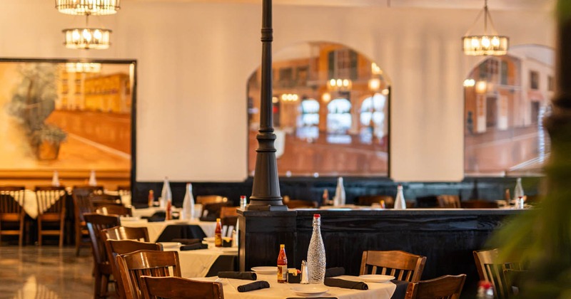 Interior, tables and chairs ready for guests