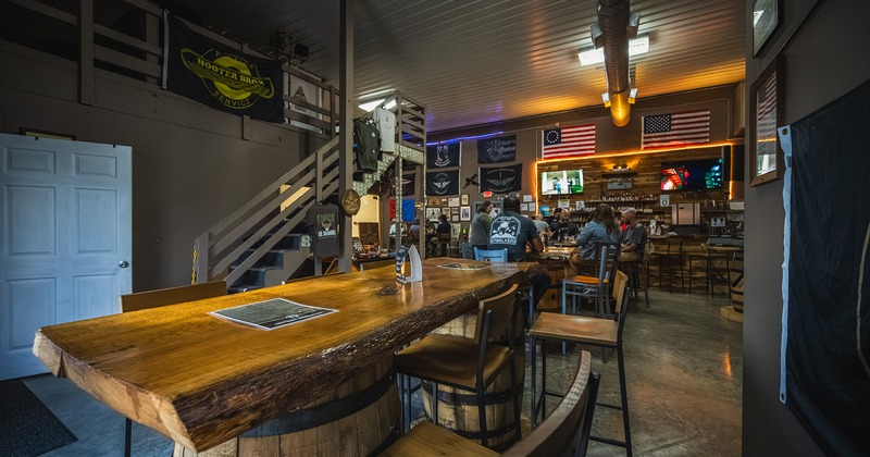 Seating area, carved wooden tables