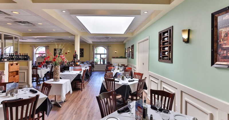 Nicely done interior dining area with set tables