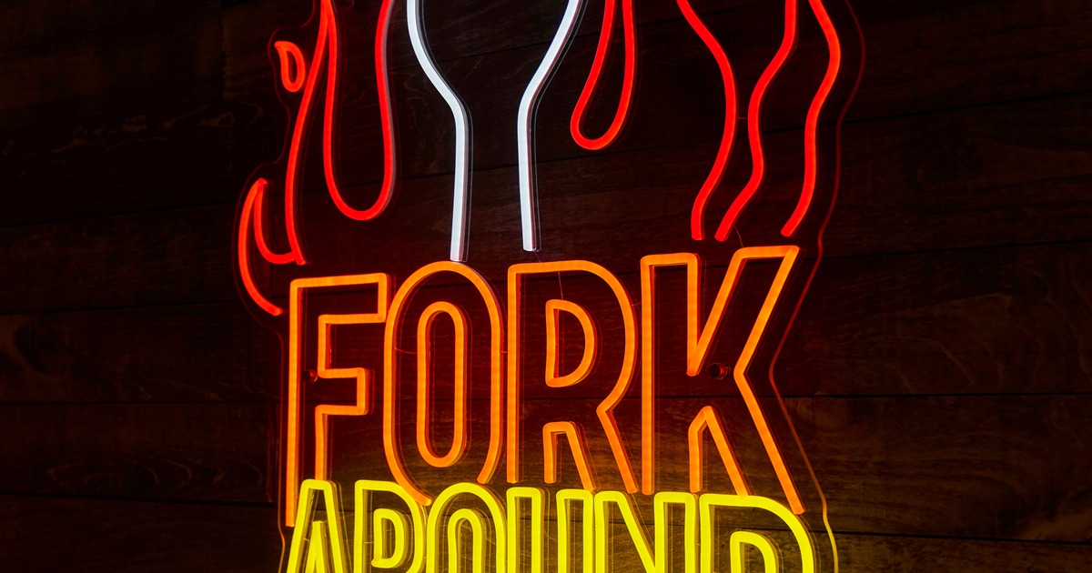 Neon sign displaying the pun 