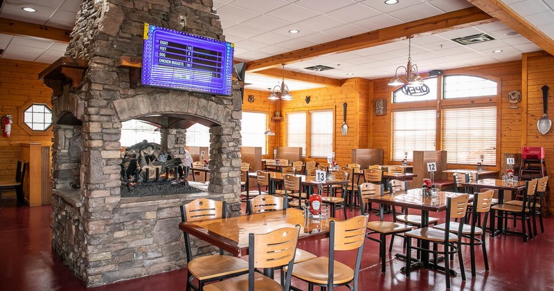 Interior, dining area, fireplace in the center