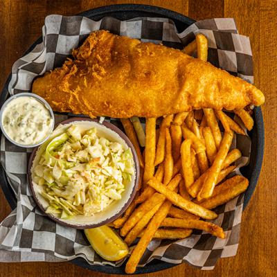 Fish dry served with french fries and coleslaw.