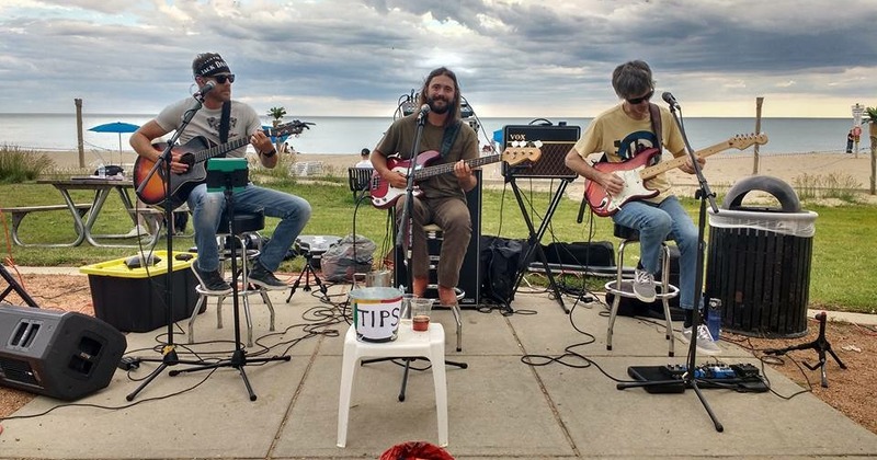 Outside, band performing live