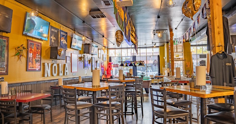 Interior, high tables and chairs in seating area