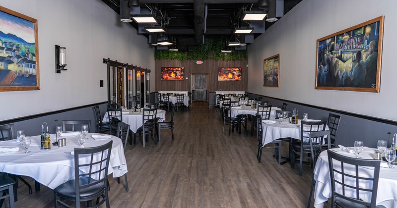Interior, dining area, tables ready for guests