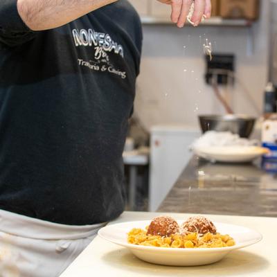 Chef preparing a dish.