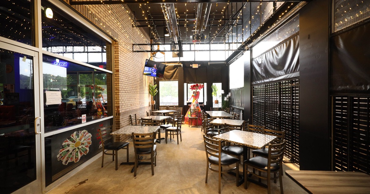 Festive restaurant interior with string lights on the ceiling