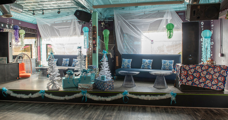 Interior, tables with blue sofas