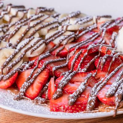 Houston Dynamo crepe with strawberries, Nutella, and ice cream.