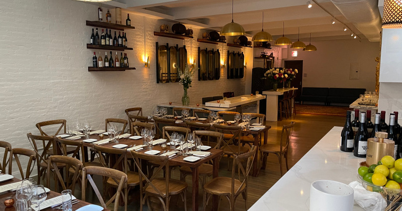 Interior, tables and a vase with flowers