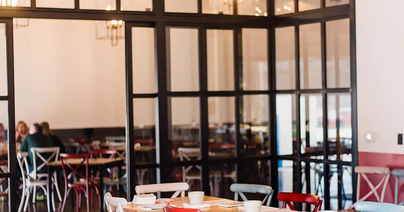 Interior, tables ready for guests