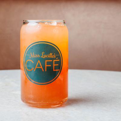 Arnold Palmer in a branded glass.