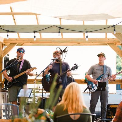 Live band performing at an outdoor venue.
