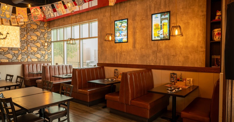Interior, seating area with booths and tables