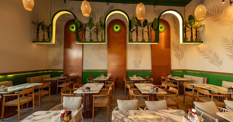 Interior, chairs and tables, decorated wall