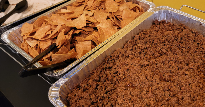 Nachos in a catering container