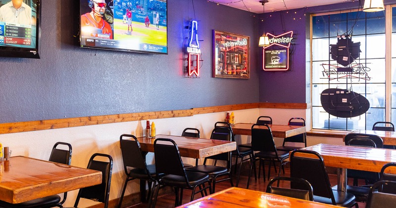 Interior, seating area, big TV's on the wall