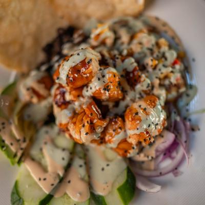 Served crispy salmon bowl.