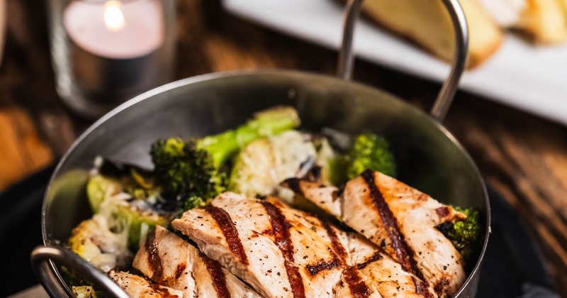 Roasted Broccoli & Brussels Sprouts topped with grilled chicken