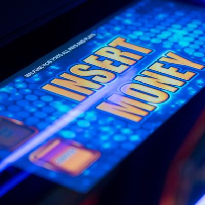 Slot machine insert money button.