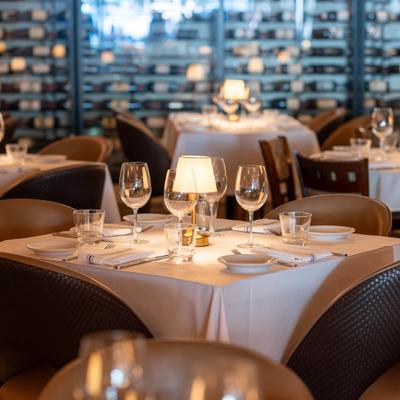 Table set for guests in dining area.