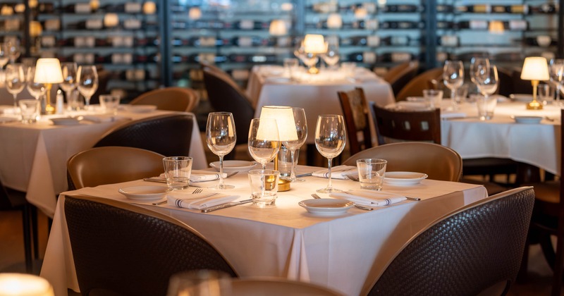 Interior, table set for guests in dining area