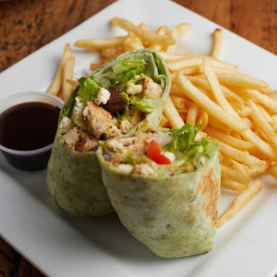 Chicken Spinach Wrap, with feta, lettuce, red onion, tomato, kalamata olives, and fries.