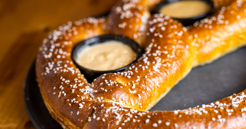 Buffalo Chicken Pretzel served with ranch and blue cheese