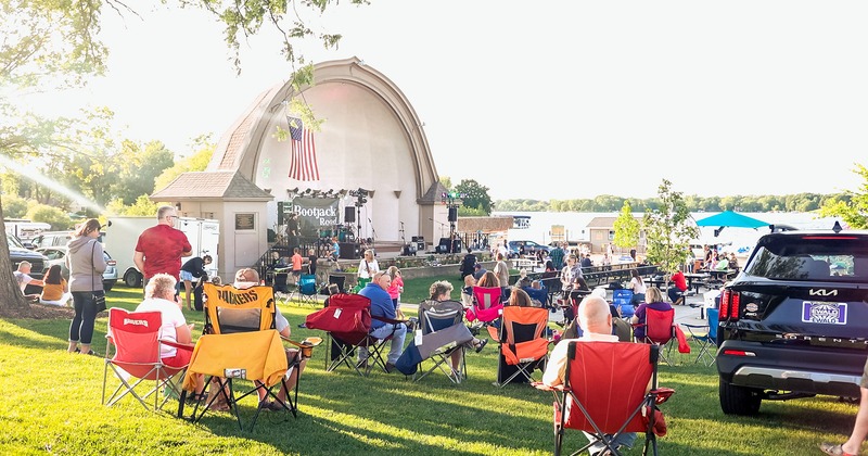 Exterior, people attending concert