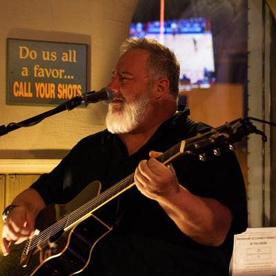 Guitar player performing.