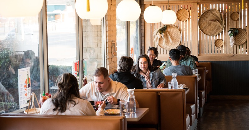 Diner area, booths, guests eating
