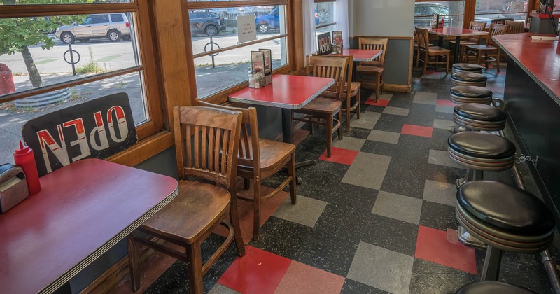 Interior, tables and chairs ready for guests