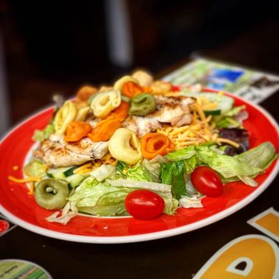 Salad with grilled chicken and tortellini.