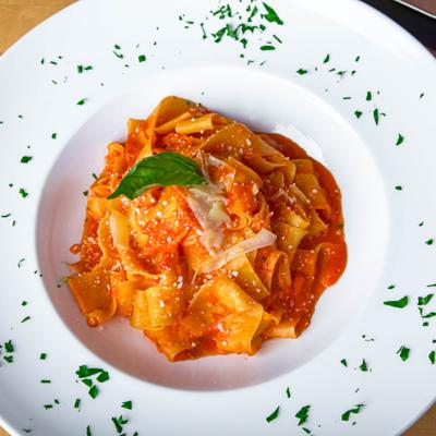 Pappardelle and marinara pasta.