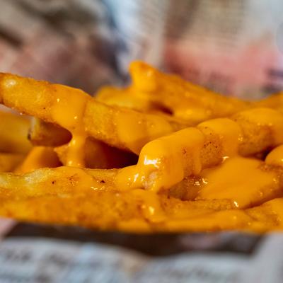 Close up of cheese fries.