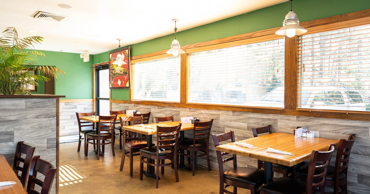 Interior, tables and chairs ready for guests