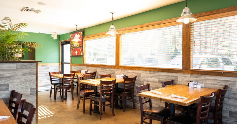 Interior, tables and chairs ready for guests