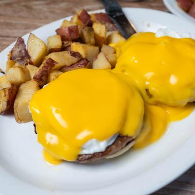 Breakfast potatoes and Eggs Benedict.