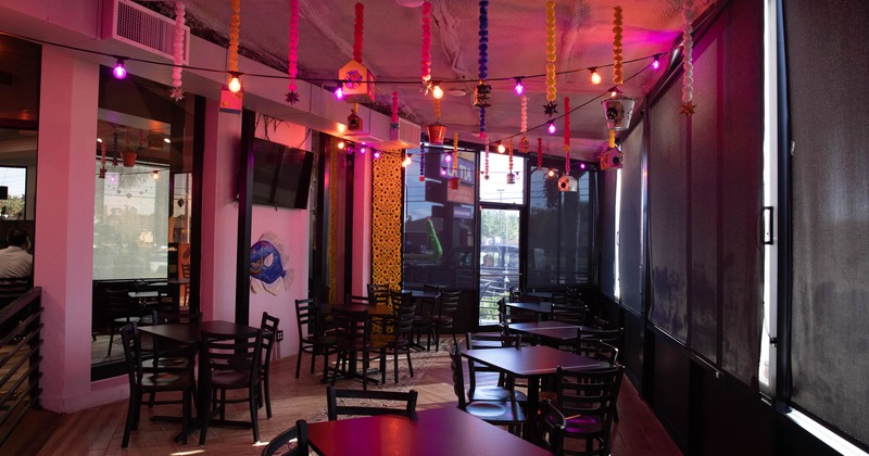 Interior, tables, chairs, decorations, windows, glass doors, wall TV