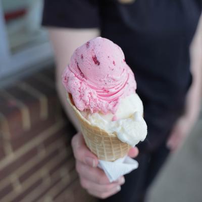big daddy ice cream cone with vanilla and strawberry ice cream.