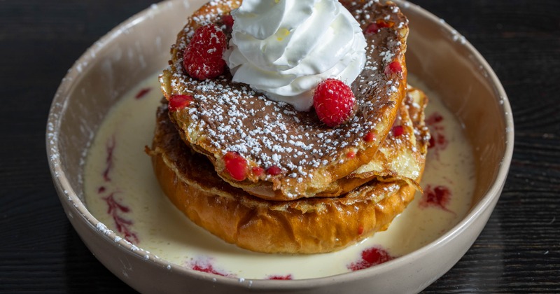 French toast with whipped cream and raspberries