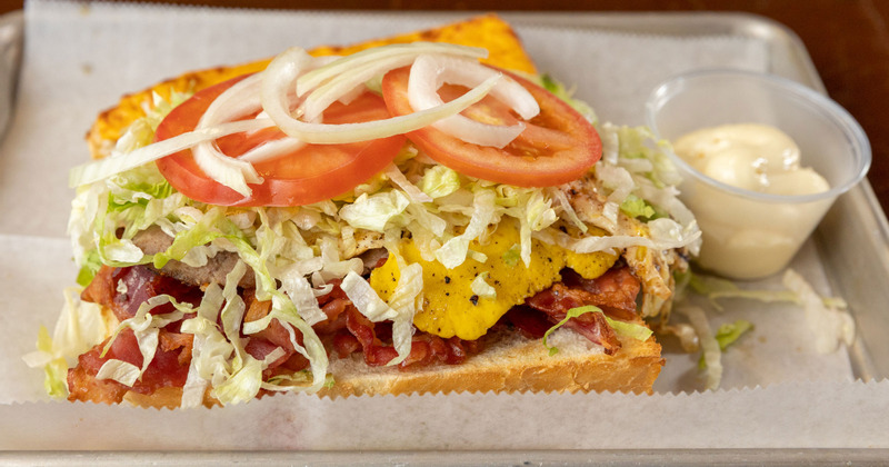 Interior, a pool table, wall- mounted tables,  chairs