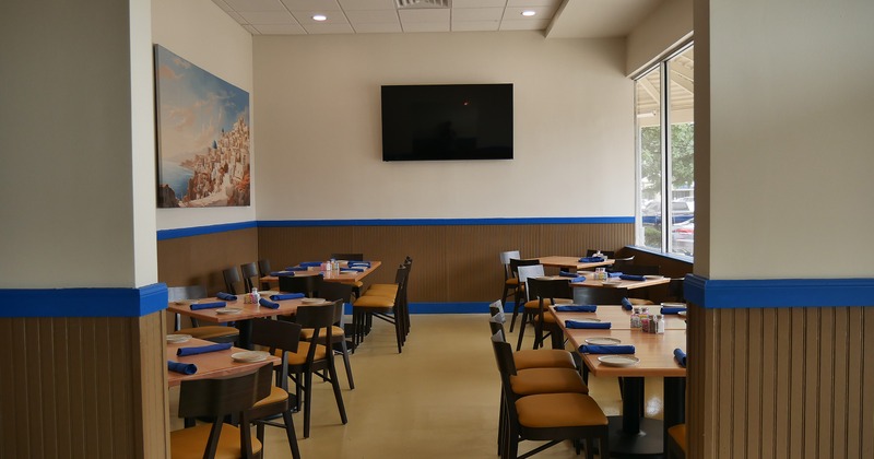 Cozy interior dining area with set tables ready for guests