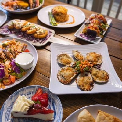 Assorted dishes spread on a table.