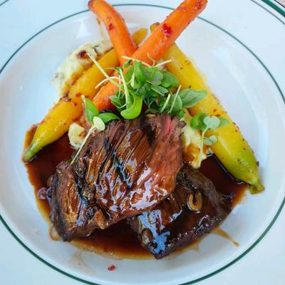 Grilled Hanger Steak with mashed potatoes and carrots.